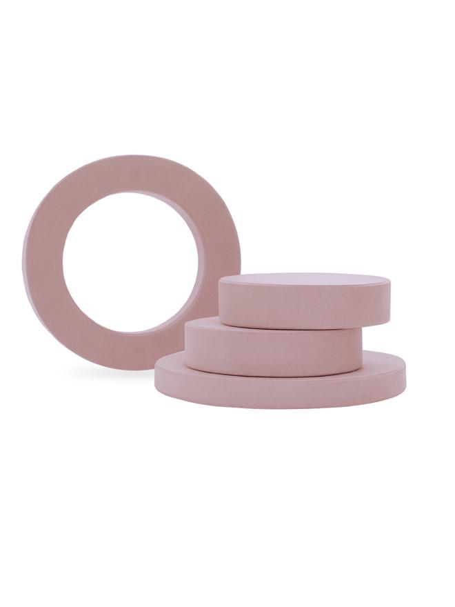 Whottie play ottoman in light pink stacked pieces with hollow ring – modular children’s play furniture
